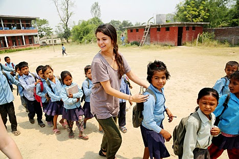 Selena-Gomez-Laughing-Enjoying-with-Children-in-Nepal